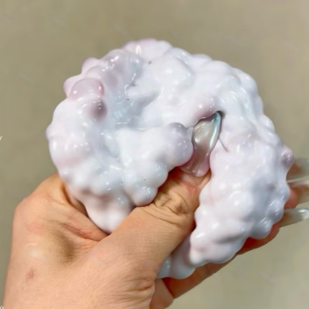 Strawberry Filled Milk Skin Stress Ball (Need to use a syringe to suck out the air)
